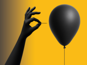 Hand met een naald en een ballon.